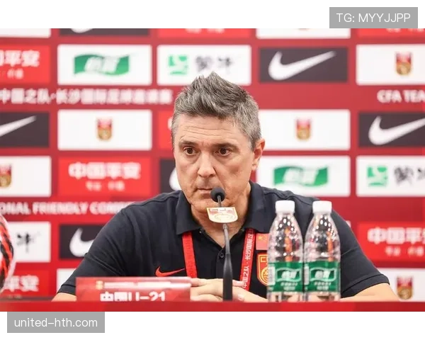 中国队新任主帅迎难而上，压力与机遇并存备受关注